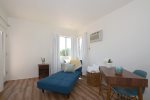 Lower level home office with futon chaise lounge